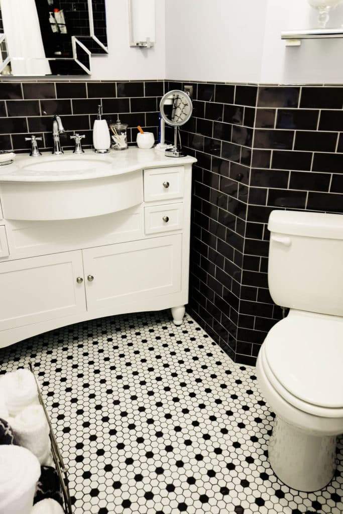 Bathroom with a black and white decor theme